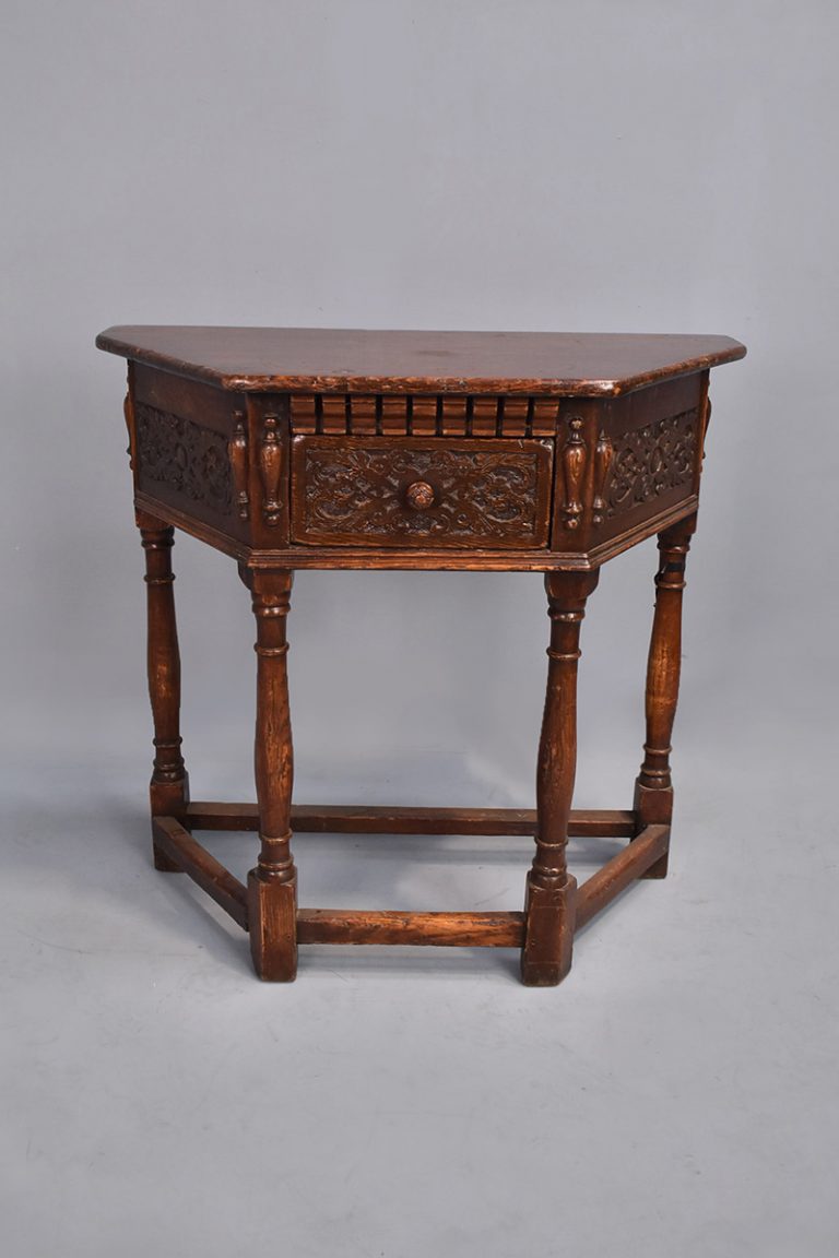 Three Sided Dark Oak Side Table With Carved Drawer Section The